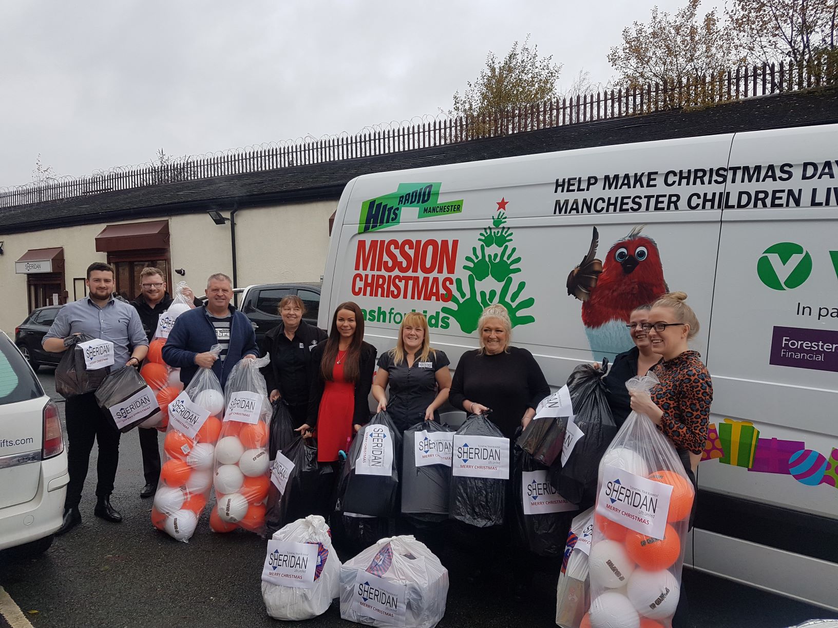 sheridan lifts staff loading up charity presents