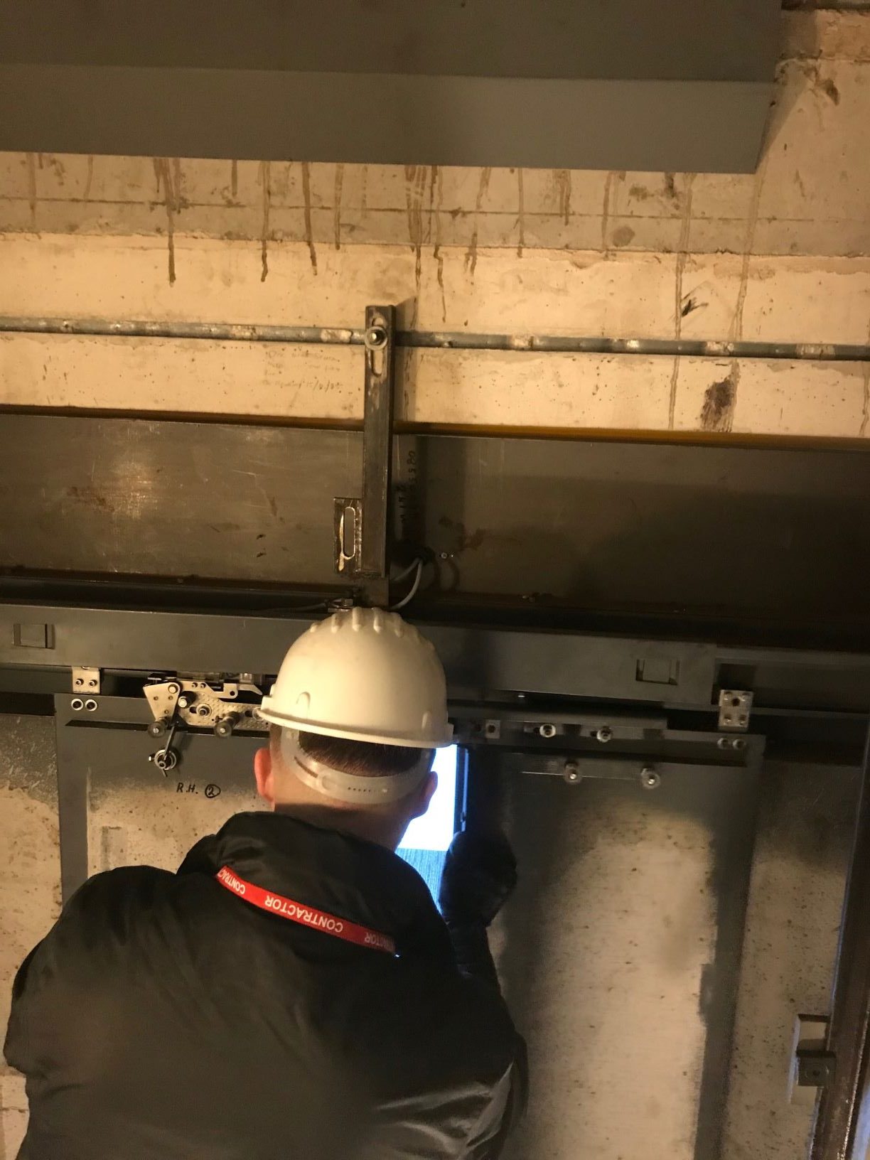 John Sheridan inspects the lifts at Phillips UK International