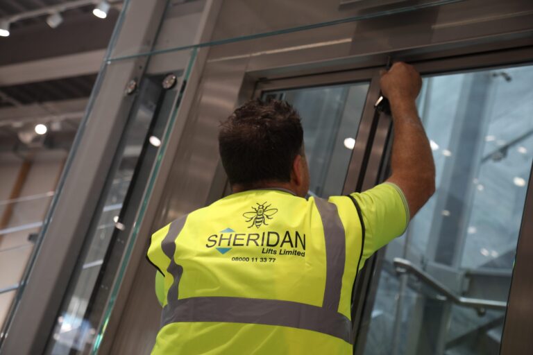 man installing a lift
