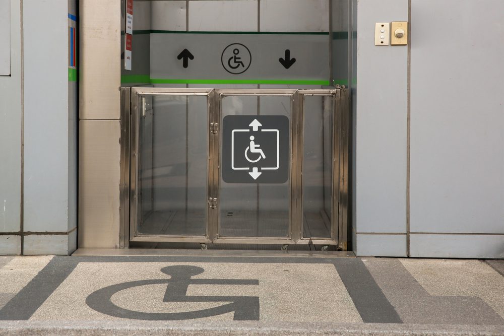 Accessible,Elevator,With,Sign.,Disabled,Persons,Lift,Near,Modern,Apartment