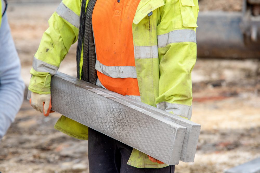 worker performing safe manual handling