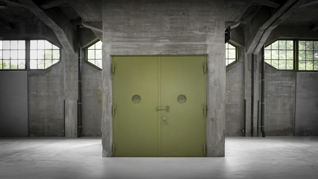 Industrial goods lift doors in a concrete building